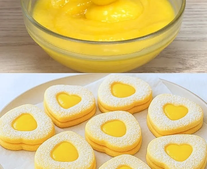 Crema al limone servita in ciotola con fette di limone fresco