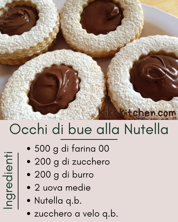 Biscotti Occhi di Bue ripieni di Nutella con zucchero a velo.