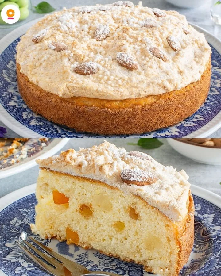 Torta Colomba decorata con mandorle e zucchero a velo, dolce pasquale tradizionale.